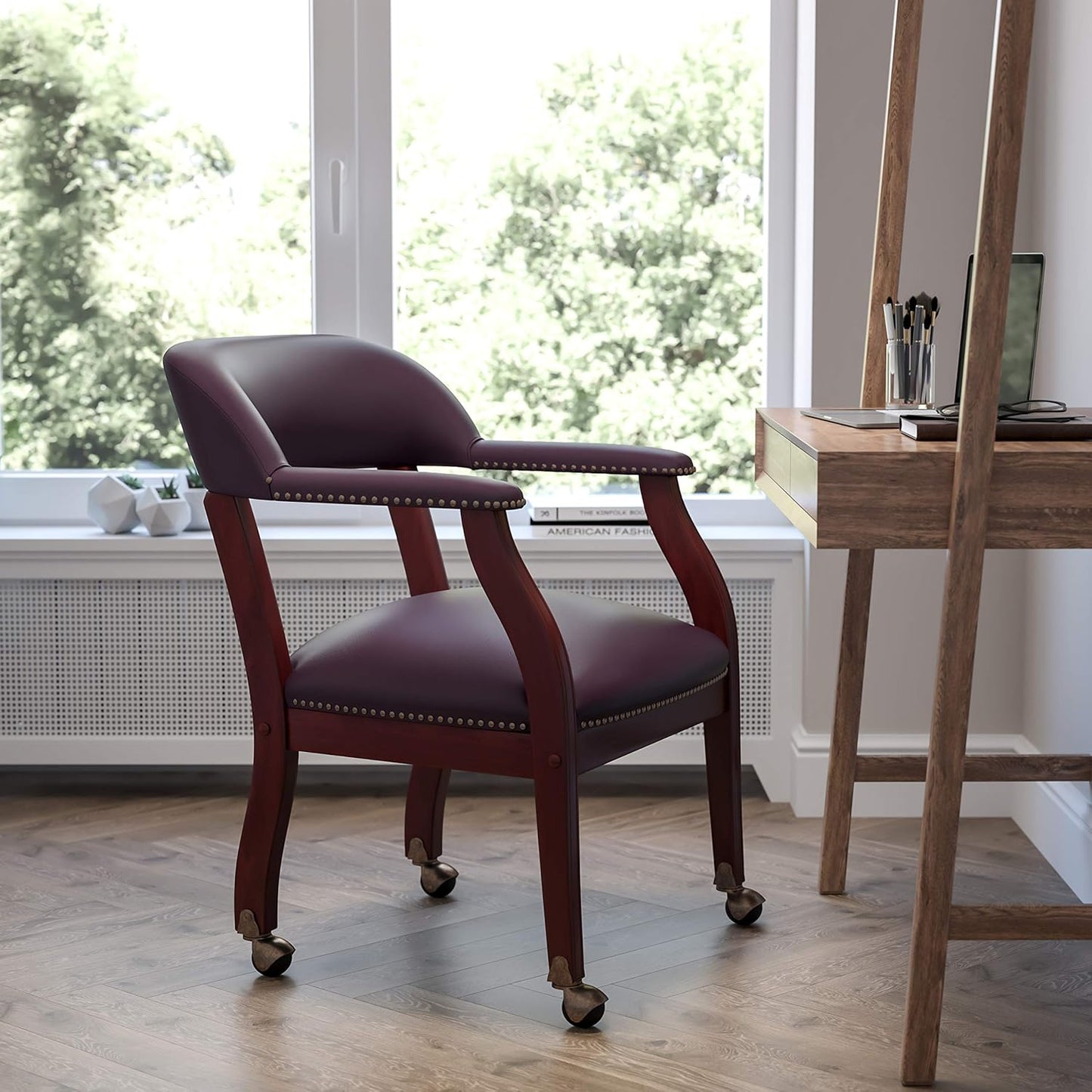 EMMA + OLIVER Burgundy LeatherSoft Conference Chair with Casters